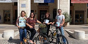 Frenquellucci in bicicletta con organizzatori evento